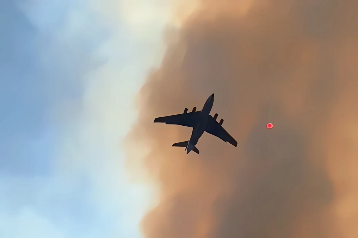 Serbia wildfire: Deliblato Sands burns while Vučić campaigns 2 Solar eclipse over the Deliblato Sands, with the Russian IL-76 flying overhead carrying 42 tonnes of water (Source: Instagram)